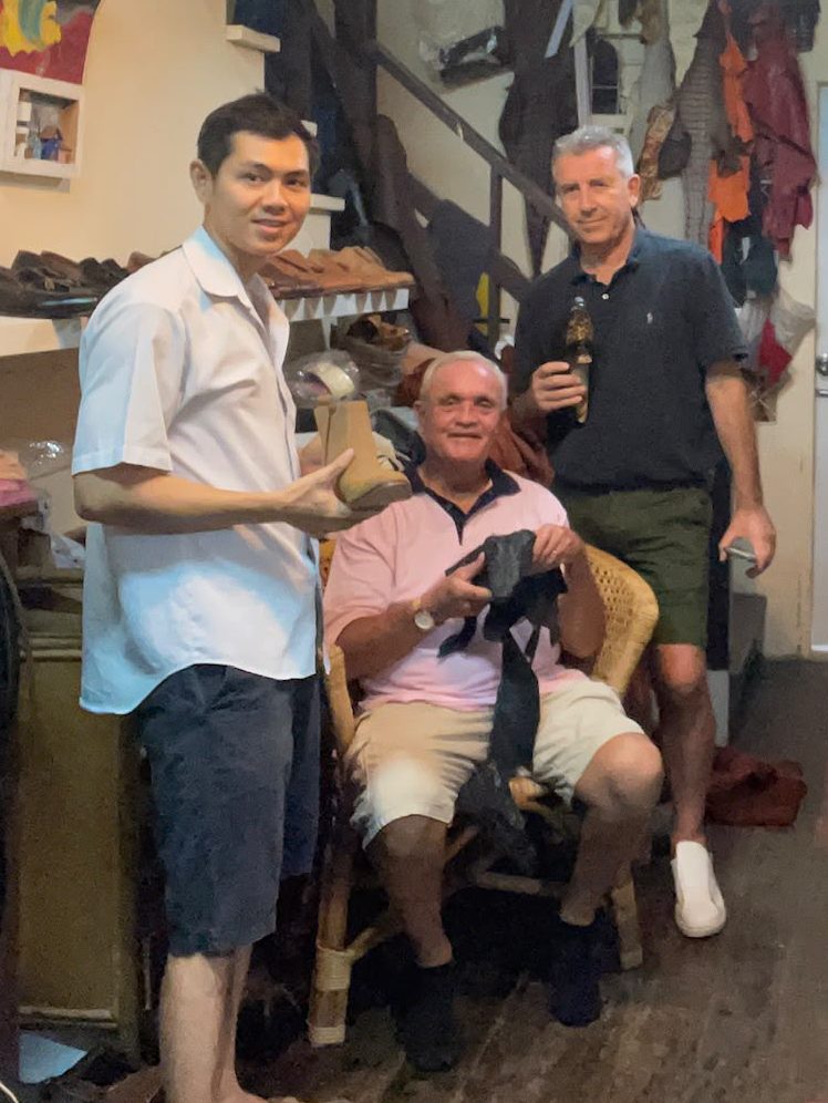 Bell and clients, showing the finished boots